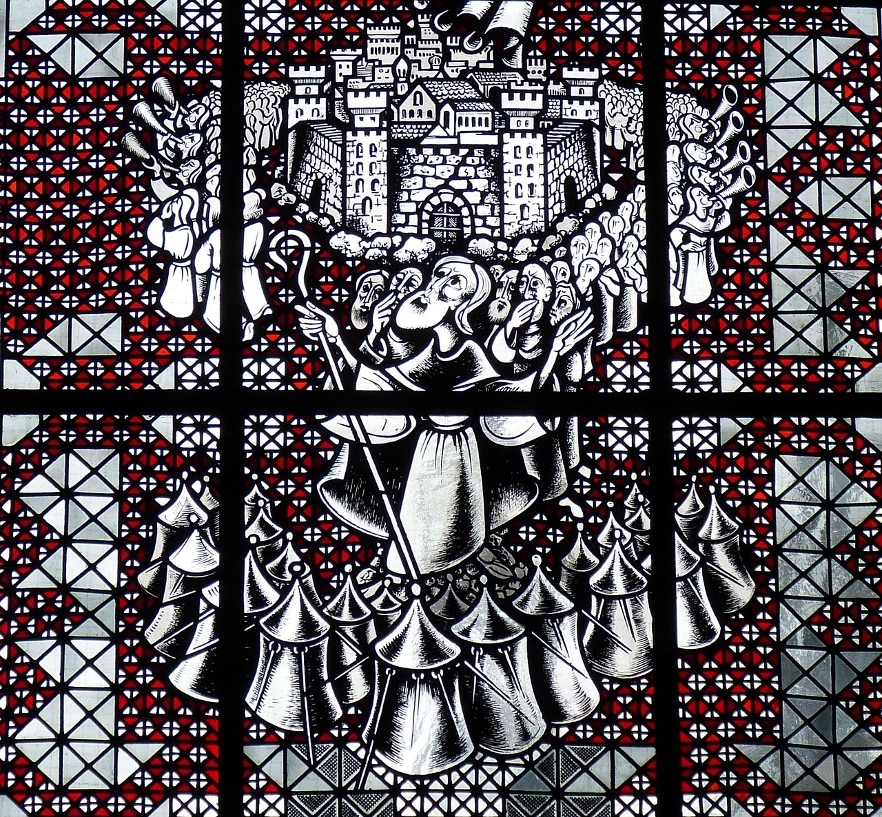 Bíblia e vitral, referência ao relato de Josué em Jericó